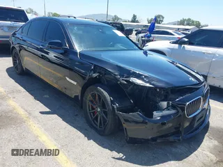2014 BMW 7 Series ALPINA B7 z VIN WBAYE8C54ED134615, wystawiony jako IAAI lot #42197002 z przebiegiem 126 805 mil mil oraz . Historia ofert i sprzedaży dostępna na DreamBid. Obrazek 1.