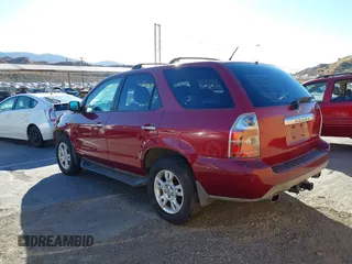 2004 Acura MDX Touring Pkg w/Navigation with VIN 2HNYD18874H519565, listed as a IAAI auction lot 41383264 with 140,095 mi miles. Bid and sale history available at carsss.com. Image 3.