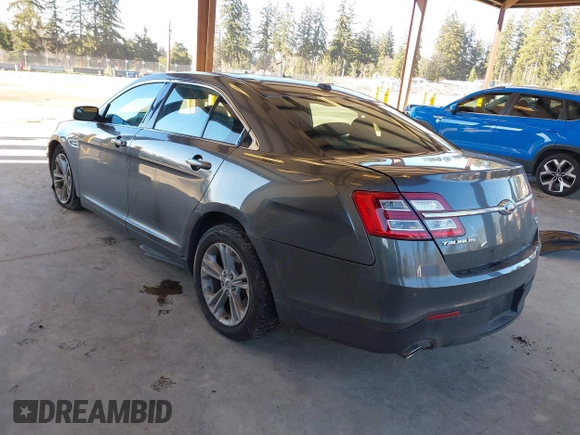 2018 Ford Taurus SEL with VIN 1FAHP2H82JG112785, listed as a IAAI auction lot 41376074 with 98,754 mi miles. Bid and sale history available at carsss.com. Image 3.