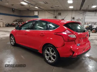 2012 Ford Focus SEL with VIN 1FAHP3M23CL460290, listed as a IAAI auction lot 41655711 with 137,743 mi miles. Bid and sale history available at carsss.com. Image 3.