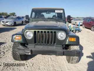 1998 Jeep Wrangler Sport with VIN 1J4FY19S0WP709843, listed as a Copart auction lot 74312254 with 147,010 mi miles and Salvage Title. Bid and sale history available at carsss.com. Image 5.