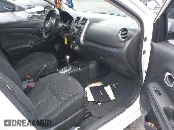 2014 Nissan Versa SV with VIN 3N1CN7AP0EL869083, listed as a IAAI auction lot 42044279 with 143,568 mi miles. Bid and sale history available at carsss.com. Image 5.