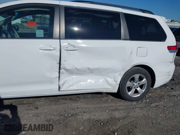 2014 Toyota Sienna LE AAS with VIN 5TDKK3DC6ES489789, listed as a IAAI auction lot 41899933 with 81,090 mi miles and . Bid and sale history available at DreamBid. Image 6.