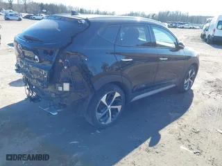 2018 Hyundai Tucson Value with VIN KM8J3CA26JU700642, listed as a IAAI auction lot 41655085 with 80,903 mi miles. Bid and sale history available at carsss.com. Image 4.