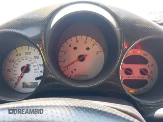 2001 Toyota MR2 z VIN JTDFR320410040517, wystawiony jako IAAI lot #42235478 z przebiegiem 61 511 mil mil oraz . Historia ofert i sprzedaży dostępna na DreamBid. Obrazek 7.