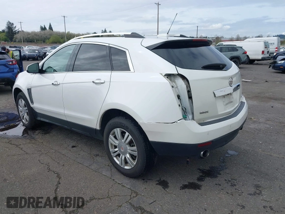 2016 Cadillac SRX Luxury Collection z VIN 3GYFNBE33GS507014, wystawiony jako IAAI lot #41979980 z przebiegiem 115 077 mil mil oraz . Historia ofert i sprzedaży dostępna na DreamBid. Obrazek 3.