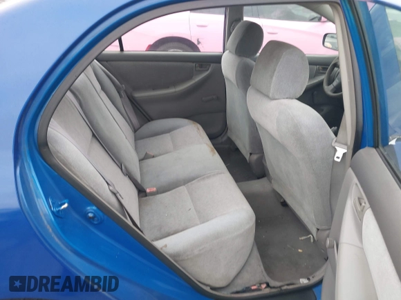 2003 Toyota Corolla CE with VIN 1NXBR32E73Z040044, listed as a IAAI auction lot 42100562 with 167,763 mi miles and . Bid and sale history available at DreamBid. Image 8.