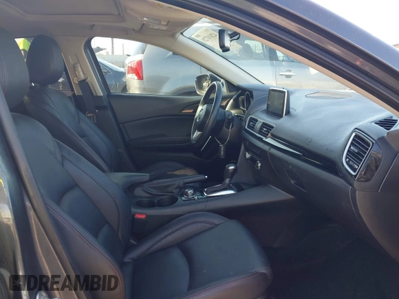 2016 Mazda Mazda3 i Grand Touring with VIN JM1BM1X79G1278079, listed as a IAAI auction lot 42010729 with 104,797 mi miles. Bid and sale history available at carsss.com. Image 5.