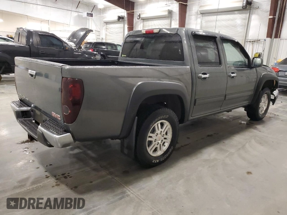 2010 GMC Canyon SLE1 with VIN 1GTJTCDE5A8148716, listed as a Copart auction lot 57559215 with 126,523 mi miles and Salvage title. Bid and sale history available at DreamBid. Image 3.