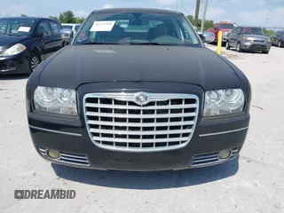 2010 Chrysler 300 Touring with VIN 2C3CA5CV7AH284713, listed as a IAAI auction lot 42221918 with 121,389 mi miles and . Bid and sale history available at DreamBid. Image 6.