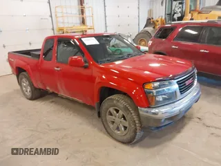 2011 GMC Canyon z VIN 1GTJ6NFE1B8109333, wystawiony jako IAAI lot #42035352 z przebiegiem 135 403 mil mil oraz . Historia ofert i sprzedaży dostępna na DreamBid. Obrazek 1.