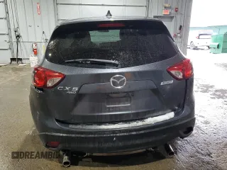 2014 Mazda CX-5 Touring with VIN JM3KE4CY6E0421738, listed as a Copart auction lot 45888885 with 103,693 mi miles and Salvage Title. Bid and sale history available at carsss.com. Image 6.