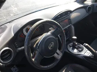 2015 Scion FR-S z VIN JF1ZNAA18F8705683, wystawiony jako IAAI lot #42178113 z przebiegiem 124 775 mil mil oraz . Historia ofert i sprzedaży dostępna na DreamBid. Obrazek 17.