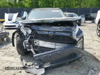2021 Toyota RAV4 XLE Premium with VIN 2T3A1RFV3MC195877, listed as a Copart auction lot 55220955 with 92,679 mi miles and Salvage title. Bid and sale history available at DreamBid. Image 5.
