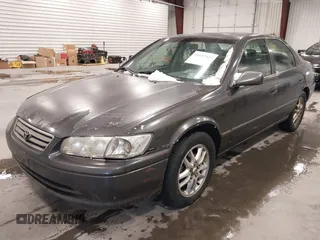 2001 Toyota Camry LE z VIN JT2BF28K110307972, wystawiony jako IAAI lot #41652522 z przebiegiem 201 631 mil mil oraz . Historia ofert i sprzedaży dostępna na DreamBid. Obrazek 2.