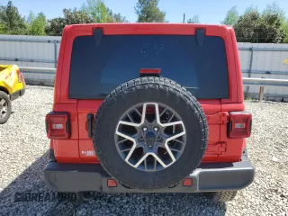 2024 Jeep Wrangler Sahara z VIN 1C4PJXEG6RW266773, wystawiony jako Copart lot #53257415 z przebiegiem 9 655 mil mil oraz Szkoda całkowita • Salvage title. Historia ofert i sprzedaży dostępna na DreamBid. Obrazek 6.
