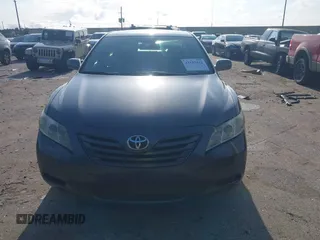 2007 Toyota Camry CE z VIN 4T1BE46K97U057970, wystawiony jako IAAI lot #42183422 z przebiegiem 145 791 mil mil oraz . Historia ofert i sprzedaży dostępna na DreamBid. Obrazek 12.