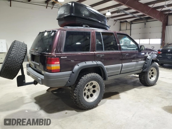 1996 Jeep Grand Cherokee Laredo with VIN 1J4GZ58Y1TC171915, listed as a Copart auction lot 50764034 with 0 mi miles and Salvage Title. Bid and sale history available at carsss.com. Image 3.