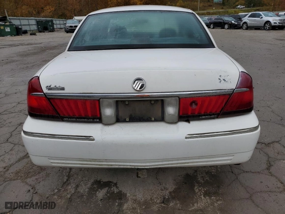 1998 Mercury Grand Marquis GS with VIN 2MEFM74WXWX619140, listed as a Copart auction lot 77300894 with 124,064 mi miles and Salvage Title. Bid and sale history available at carsss.com. Image 6.