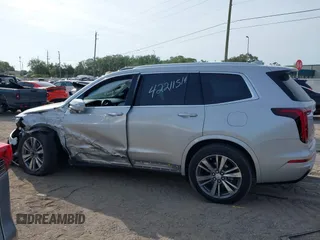2020 Cadillac XT6 FWD Premium Luxury z VIN 1GYKPCRSXLZ136057, wystawiony jako IAAI lot #42211514 z przebiegiem 32 476 mil mil oraz . Historia ofert i sprzedaży dostępna na DreamBid. Obrazek 14.