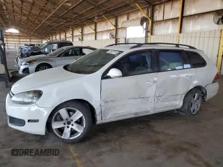 2012 Volkswagen Jetta S with VIN 3VWKP7AJ4CM627948, listed as a Copart auction lot 74823114 with 124,349 mi miles and Salvage title. Bid and sale history available at DreamBid. Image 1.