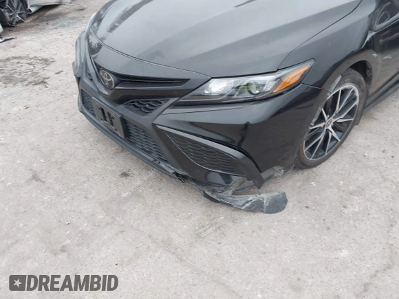 2023 Toyota Camry SE with VIN 4T1G11AK7PU123665, listed as a IAAI auction lot 41142628 with 67,294 mi miles and . Bid and sale history available at DreamBid. Image 6.