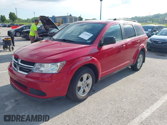 2014 Dodge Journey American Value with VIN 3C4PDCAB2ET221193, listed as a IAAI auction lot 42269264 with 201,257 mi miles and . Bid and sale history available at DreamBid. Image 2.