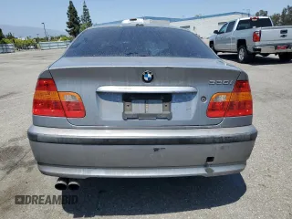 2005 BMW 3 Series 330i with VIN WBAEV53485KM39295, listed as a Copart auction lot 61581235 with 185,054 mi miles and Salvage title. Bid and sale history available at DreamBid. Image 6.