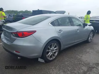 2016 Mazda 6 i Touring with VIN JM1GJ1V57G1434250, listed as a IAAI auction lot 42241857 with 68,011 mi miles and . Bid and sale history available at DreamBid. Image 4.