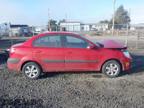 2009 Kia Rio LX with VIN KNADE223796485606, listed as a IAAI auction lot 41676881 with 58,852 mi miles and . Bid and sale history available at DreamBid. Image 13.