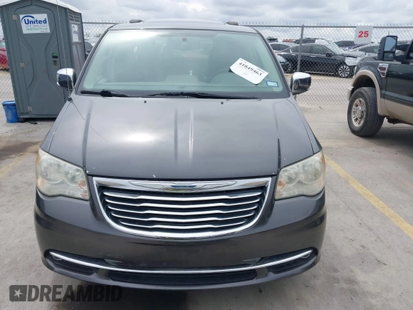 2014 Chrysler Town & Country Touring L with VIN 2C4RC1CG7ER300693, listed as a IAAI auction lot 41849463 with 174,203 mi miles and . Bid and sale history available at carsss.com. Image 6.