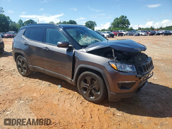 2021 Jeep Compass Altitude with VIN 3C4NJCBB5MT571365, listed as a Copart auction lot 56842455 with 82,118 mi miles and Salvage title. Bid and sale history available at DreamBid. Image 4.