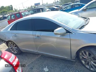 2013 Cadillac XTS Luxury z VIN 2G61R5S38D9228339, wystawiony jako IAAI lot #42664948 z przebiegiem 105 917 mil mil oraz . Historia ofert i sprzedaży dostępna na DreamBid. Obrazek 14.