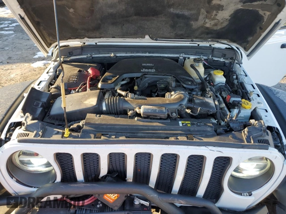 2018 Jeep Wrangler Unlimited Rubicon with VIN 1C4HJXFG8JW104425, listed as a Copart auction lot 87545965 with 62,988 mi miles and Salvage title. Bid and sale history available at DreamBid. Image 11.