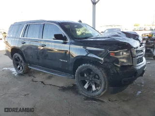 2019 Chevrolet Tahoe LS with VIN 1GNSCAKC1KR154705, listed as a Copart auction lot 87881225 with 81,647 mi miles and Salvage Title. Bid and sale history available at carsss.com. Image 4.