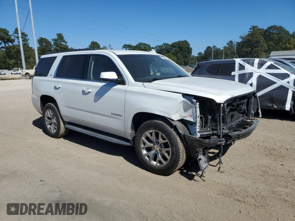 2016 GMC Yukon SLT with VIN 1GKS1BKC4GR138658, listed as a Copart auction lot 76634664 with 132,358 mi miles and Salvage Title. Bid and sale history available at carsss.com. Image 4.