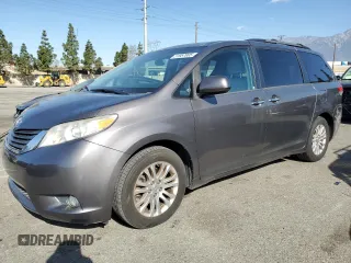 2013 Toyota Sienna XLE AAS with VIN 5TDYK3DC8DS323329, listed as a Copart auction lot 51957005 with 157,638 mi miles and Salvage title. Bid and sale history available at DreamBid. Image 1.