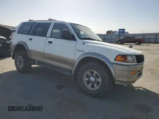 1997 Mitsubishi Montero LS z VIN JA4MT31P8VP005560, wystawiony jako Copart lot #75928354 z przebiegiem 187 136 mil mil oraz Szkoda całkowita • Salvage title. Historia ofert i sprzedaży dostępna na DreamBid. Obrazek 4.