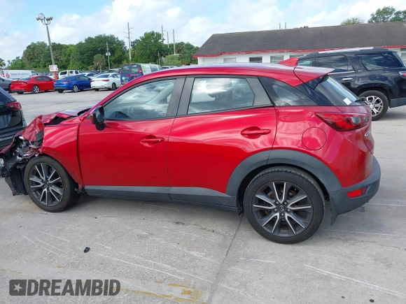 2018 Mazda CX-3 Touring with VIN JM1DKDC7XJ0318219, listed as a IAAI auction lot 41941104 with 86,186 mi miles. Bid and sale history available at carsss.com. Image 14.