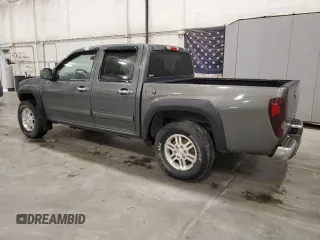 2010 GMC Canyon SLE1 with VIN 1GTJTCDE5A8148716, listed as a Copart auction lot 57559215 with 126,523 mi miles and Salvage title. Bid and sale history available at DreamBid. Image 2.