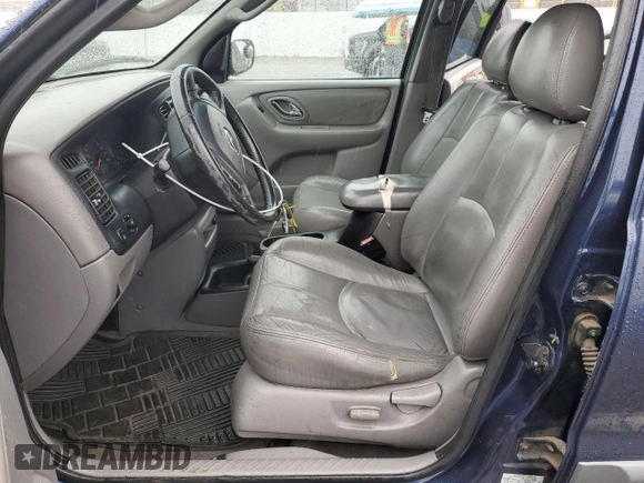 2002 Mazda Tribute LX with VIN 4F2YU09132KM45424, listed as a Copart auction lot 47778905 with 196,982 mi miles and Salvage Title. Bid and sale history available at carsss.com. Image 7.
