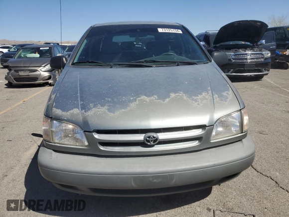 2000 Toyota Sienna CE with VIN 4T3GF19C9YU272554, listed as a Copart auction lot 73125134 with 240,998 mi miles and Salvage Title. Bid and sale history available at carsss.com. Image 5.
