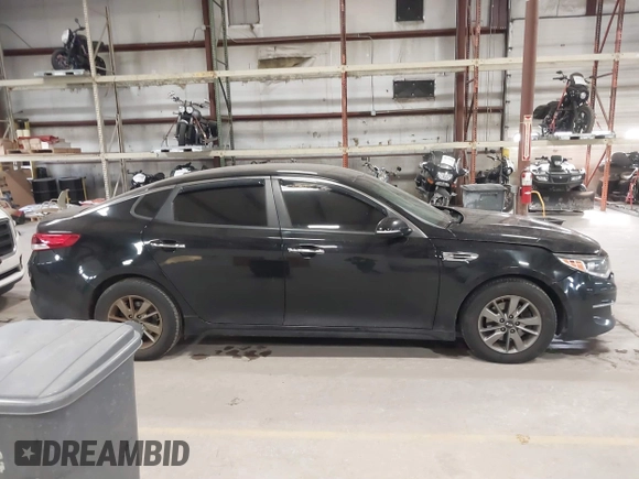 2016 Kia Optima LX Turbo with VIN 5XXGT4L16GG013751, listed as a IAAI auction lot 41843481 with 163,969 mi miles. Bid and sale history available at carsss.com. Image 13.
