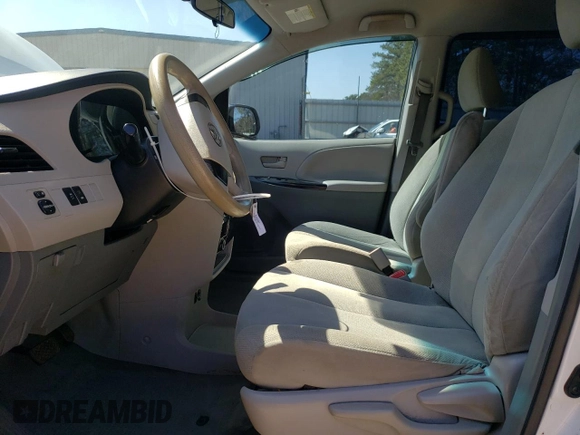 2014 Toyota Sienna L with VIN 5TDZK3DC2ES500950, listed as a Copart auction lot 48524035 with 194,957 mi miles and Salvage Title. Bid and sale history available at carsss.com. Image 7.