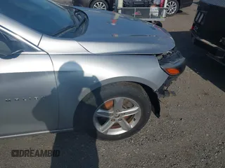 2019 Chevrolet Malibu LS with VIN 1G1ZB5STXKF147683, listed as a IAAI auction lot 42123608 with 104,692 mi miles and . Bid and sale history available at DreamBid. Image 20.