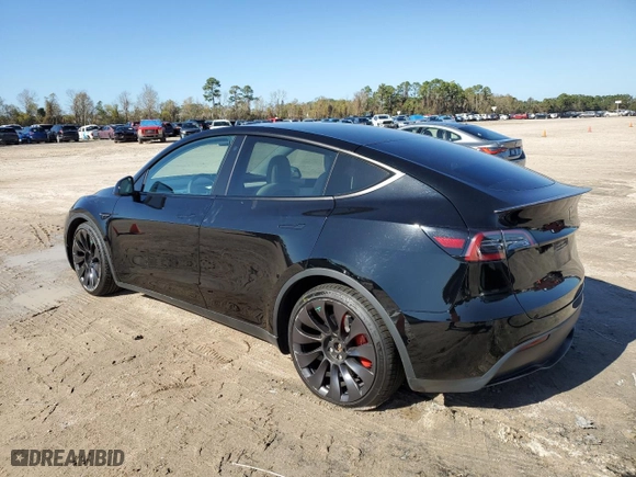 2022 Tesla Model Y Performance with VIN 7SAYGDEF5NF337004, listed as a Copart auction lot 85801004 with 24,945 mi miles and Salvage Title. Bid and sale history available at carsss.com. Image 2.