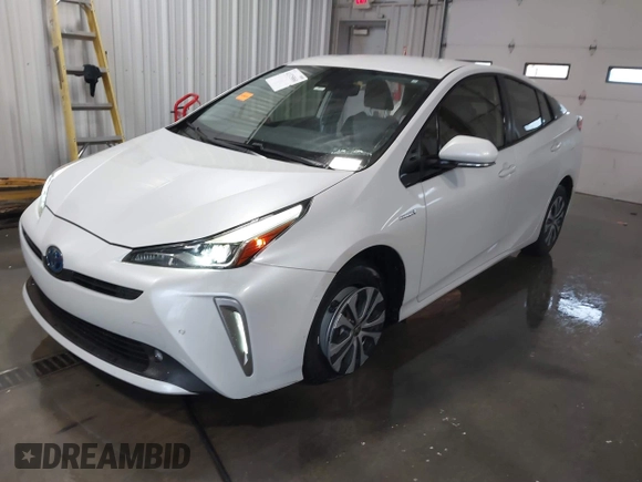 2021 Toyota Prius LE with VIN JTDL9MFU9M3025214, listed as a IAAI auction lot 41375860 with 76,259 mi miles and . Bid and sale history available at DreamBid. Image 2.