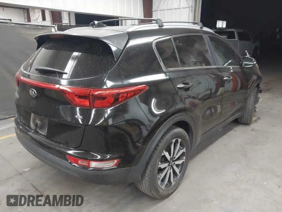 2018 Kia Sportage EX with VIN KNDPN3AC5J7353577, listed as a IAAI auction lot 42058456 with 156,783 mi miles and . Bid and sale history available at DreamBid. Image 4.