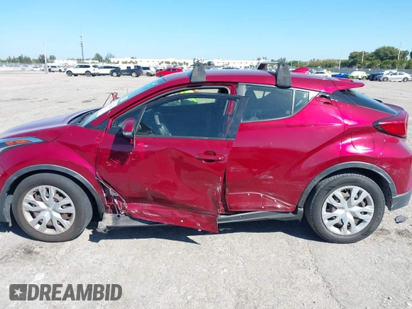 2019 Toyota C-HR XLE with VIN JTNKHMBX5K1044846, listed as a IAAI auction lot 41670614 with 52,374 mi miles. Bid and sale history available at carsss.com. Image 6.