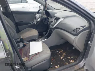 2014 Hyundai Accent GLS with VIN KMHCT4AE6EU670895, listed as a IAAI auction lot 42197066 with 142,983 mi miles and . Bid and sale history available at carsss.com. Image 5.
